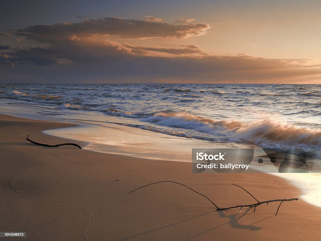 Spiaggia al tramonto - Foto stock royalty-free di Acqua