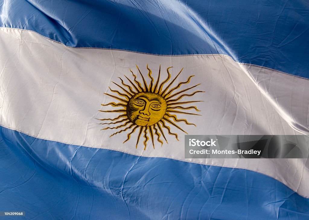 Flag of Argentina A large flag of of Argentina captured at the legendary Plaza de Mayo. This is a real flag, under real circumstances in open space and with daylight. Argentina Stock Photo