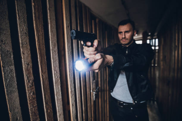 istock Police agent on a criminal pursuit 1042091284