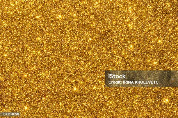 Golden Glitter For Texture Or Background - Fotografias de stock e mais imagens de Ouro - Metal - Ouro - Metal, Brilhante - Reluzente, Dourado - Cores