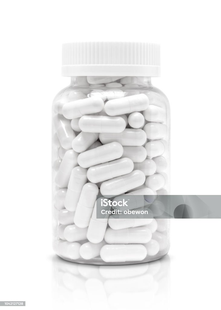 투명 한 플라스틱 병에 흰색 약 또는 보충 캡슐 - 로열티 프리 알약 스톡 사진