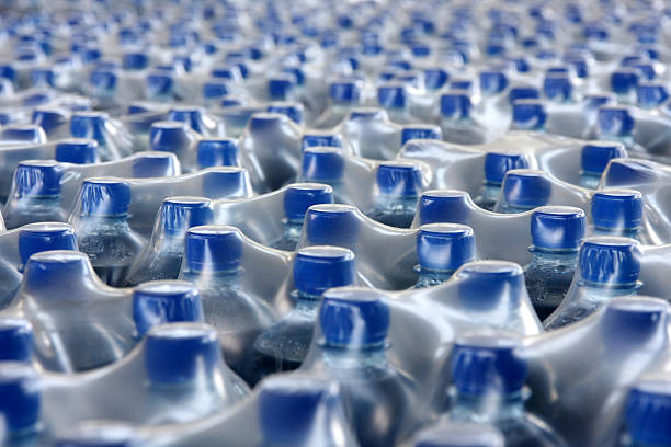 Juice bottles, packaged and stacked stock photo