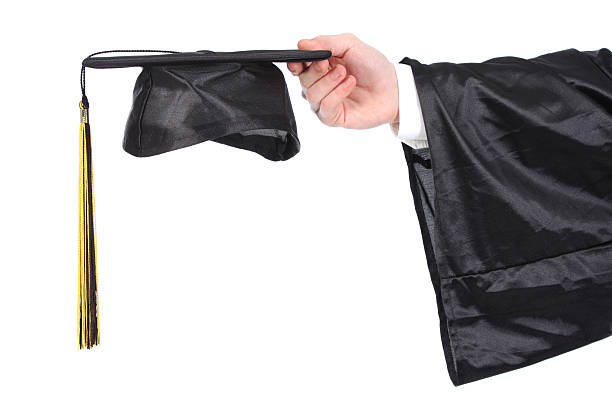 istock graduation gown and mortarboard 104213367