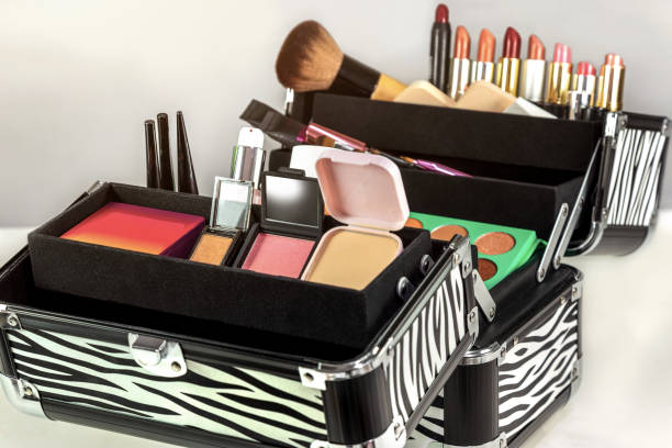 istock Make up case containing colorful eyeshadows, lipsticks, lip glosses, blushes and nail polishes 1042133754