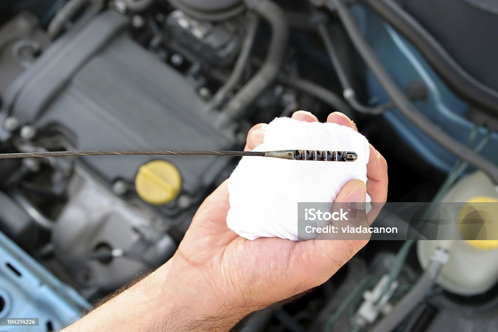 engine oil dipstick Details checking engine oil dipstick in car Oil Change Stock Photo
