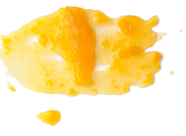 istock Spread apricot jam over white isolated background 1042146084