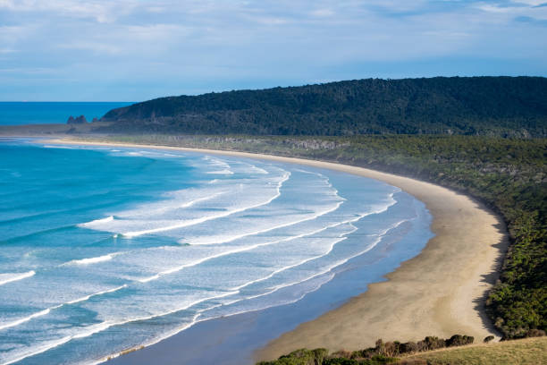 istock Long beach stretch along coastline in New Zealand 1042149624