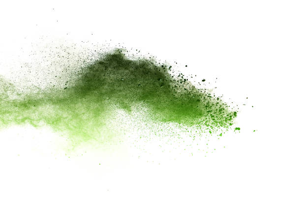 istock Green powder explosion on white background. 1042153910