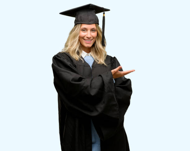 istock Young graduate woman holding something in empty hand 1042160912