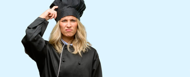 istock Beautiful cook woman chef doubt expression, confuse and wonder concept, uncertain future 1042161446