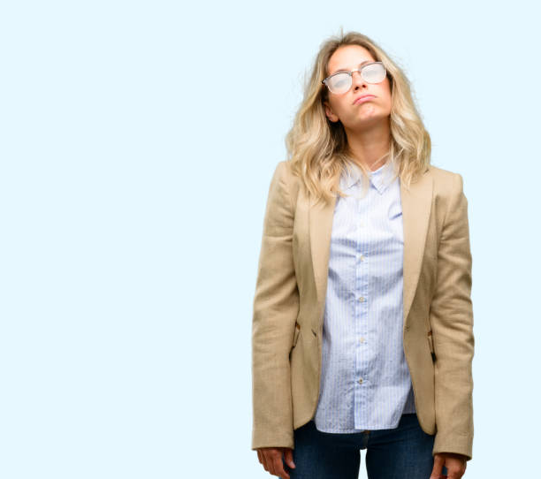 istock Young beautiful woman with sleepy expression, being overworked and tired 1042161814