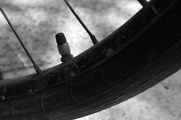 istock Bike valve and tyre 104217281