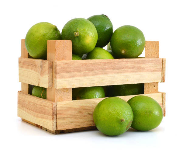 istock A green lemons on wooden box 1042178184