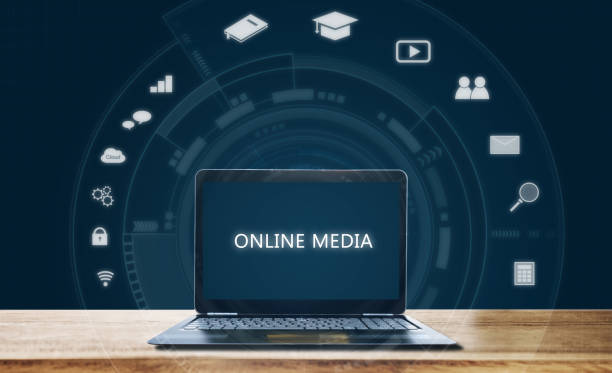 istock Online media on computer laptop. Online media applications 1042181036