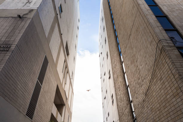 istock Space between buildings on the sky and sunshine background 1042181492