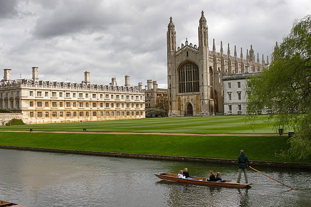 View of Cambridge university and a punt Great view on King's Chapel. King's College, Cambridge, UK cambridge england stock pictures, royalty-free photos & images
