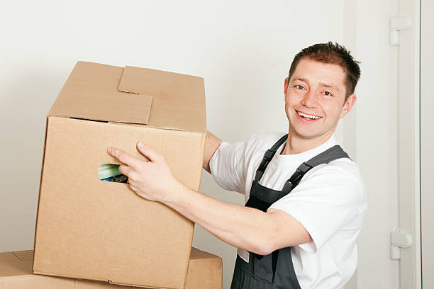 istock Mover with boxes in the course of relocation 104221256