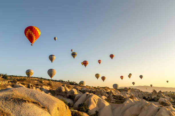 istock Hot air balloons flying 1042217274