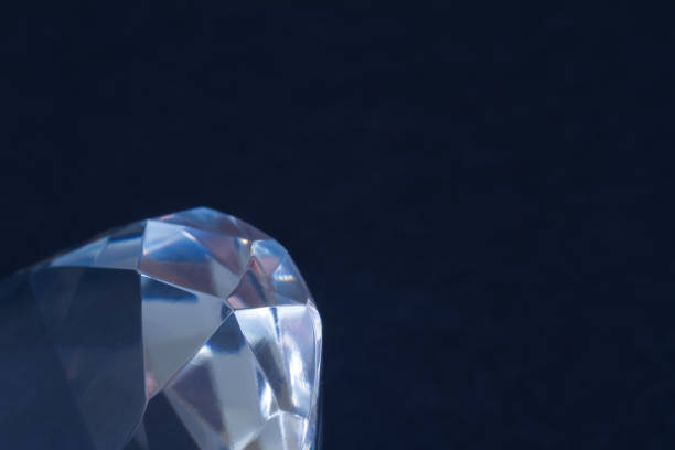 istock Diamond elements close-up on a black background. Abstraction. Defocused. 1042240534