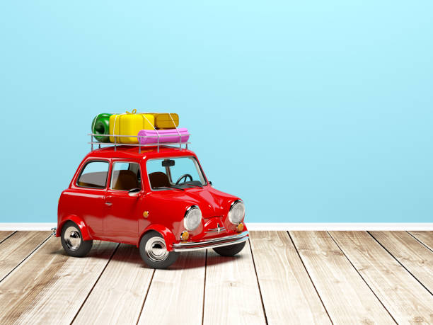 istock small retro travel car on floor 1042273586