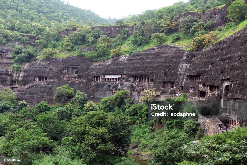 The view of Ajanta caves, the rock-cut Buddhist monuments. The view of Ajanta caves, the rock-cut Buddhist monuments. Taken in India, August 2018. Ajanta Caves Stock Photo