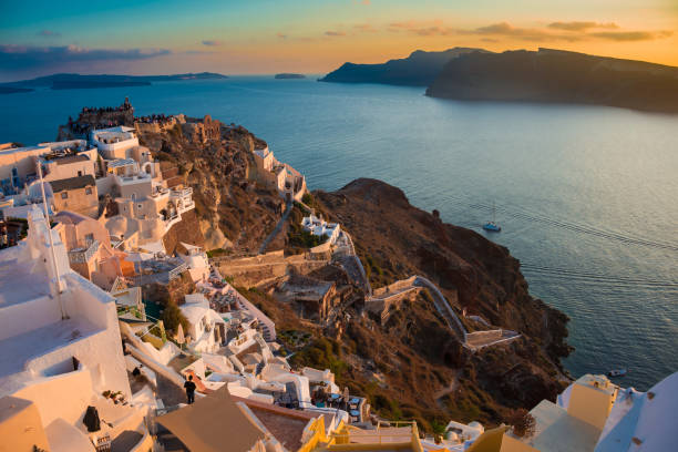 istock Sunset in Oia on Santorini island, Greece 1042284250