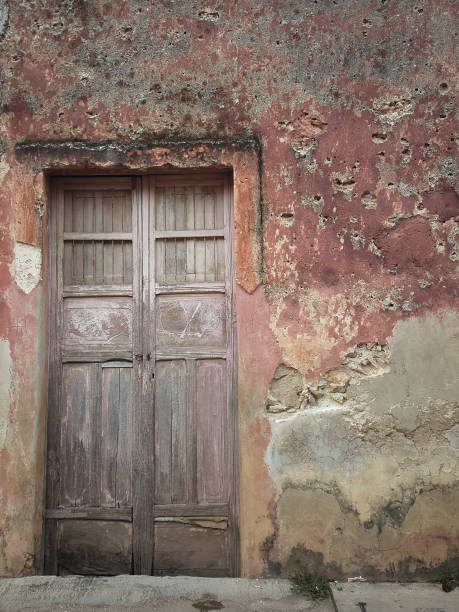 istock Rustic door and wall in Mexico 1042285296