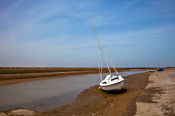 istock Boat on beach at low tide 104228645