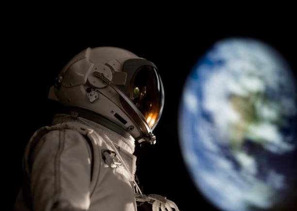 istock large earth and astronaut 1042288912