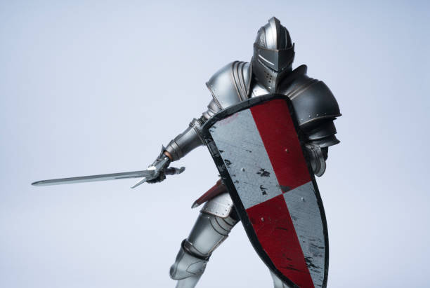 knight swinging sword knight in silver armour with shield sword photos stock pictures, royalty-free photos & images