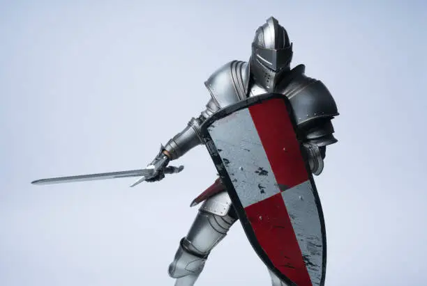 knight in silver armour with shield