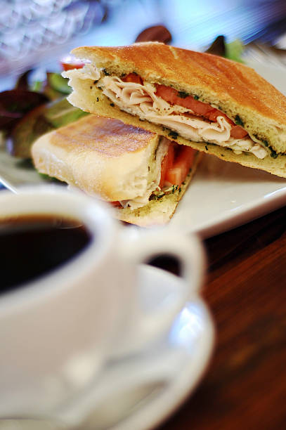 istock Coffee and Turkey pesto panini sandwich 104229885