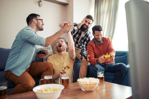 istock Friends having fun at home 1042305078