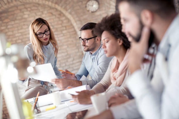 istock Business team sitting in office and planning work 1042315290