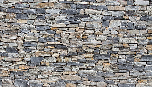 istock stone wall of a buliding 104231812
