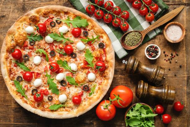 tasty italian pizza with tomato mozzarella cheese - mozzarella cheese italy tomato imagens e fotografias de stock