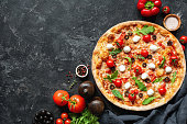 Italian Pizza On Black Concrete Background