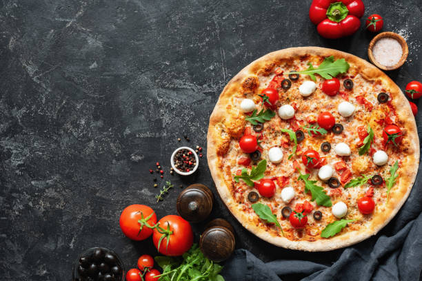 italian pizza on black concrete background - mozzarella cheese italy tomato imagens e fotografias de stock