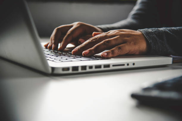 istock Business woman working on laptop computer in office 1042322456