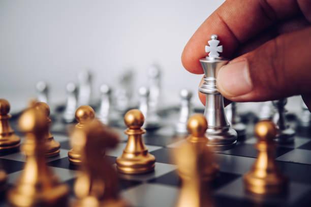 istock businessmen are using chess ideas - business planning ideas 1042322568
