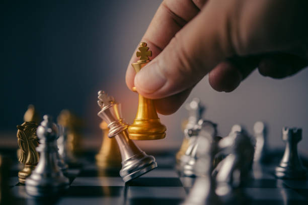 istock businessmen are using chess ideas - business planning ideas 1042322632