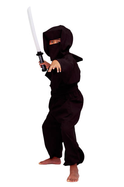 istock A ninja with a sword on white background 1042327898