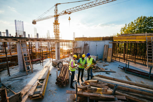 istock Engineers on the top of the construction site 1042331410