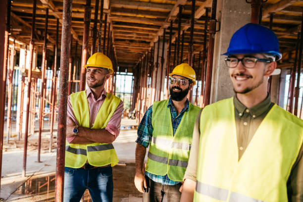 istock Commission of engineers evaluating the construction works 1042335390