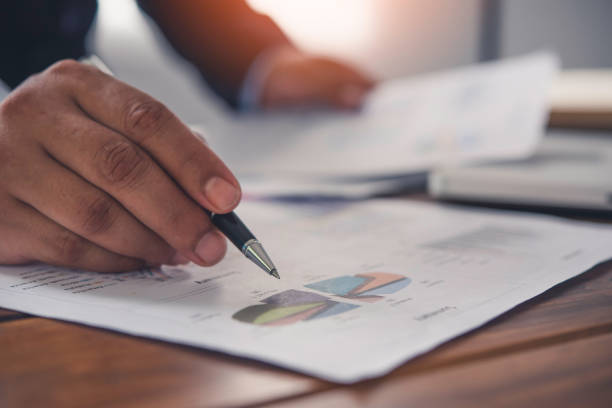 istock Business people are working on accounts in business analysis with graphs and documentation. 1042336120