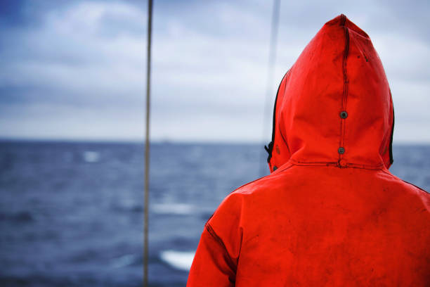 istock Fisherman on the fishing boat deck 1042336654