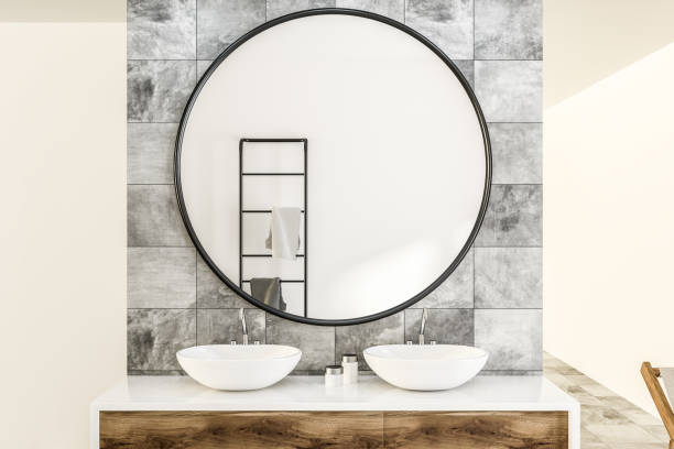 istock White double bathroom sink in marble room 1042339394