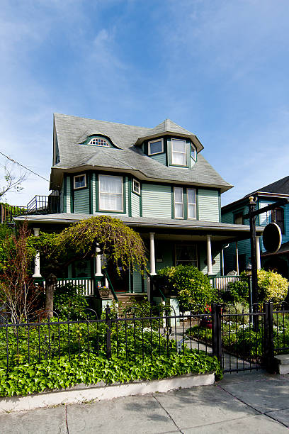 istock Beautiful green Victorian home 104234340