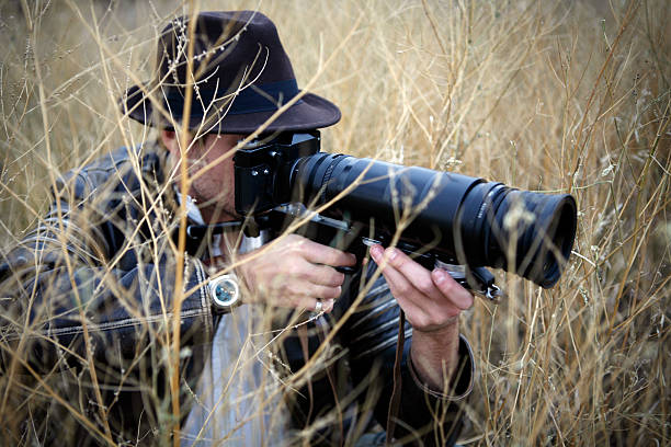 istock Photographer Catching His Prey 104234395