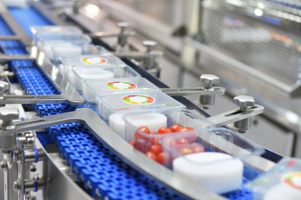 istock Food products boxs transfer on Automated conveyor systems 1042346152